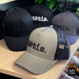 A cap TĒTIS.